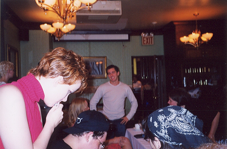 JE in background